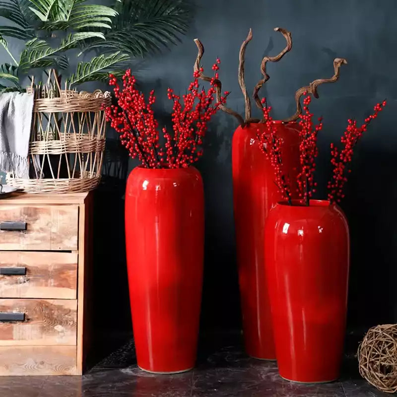 Grand vase rouge à poser au sol