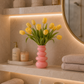 Vase en verre rose