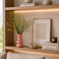 Vase en verre rose