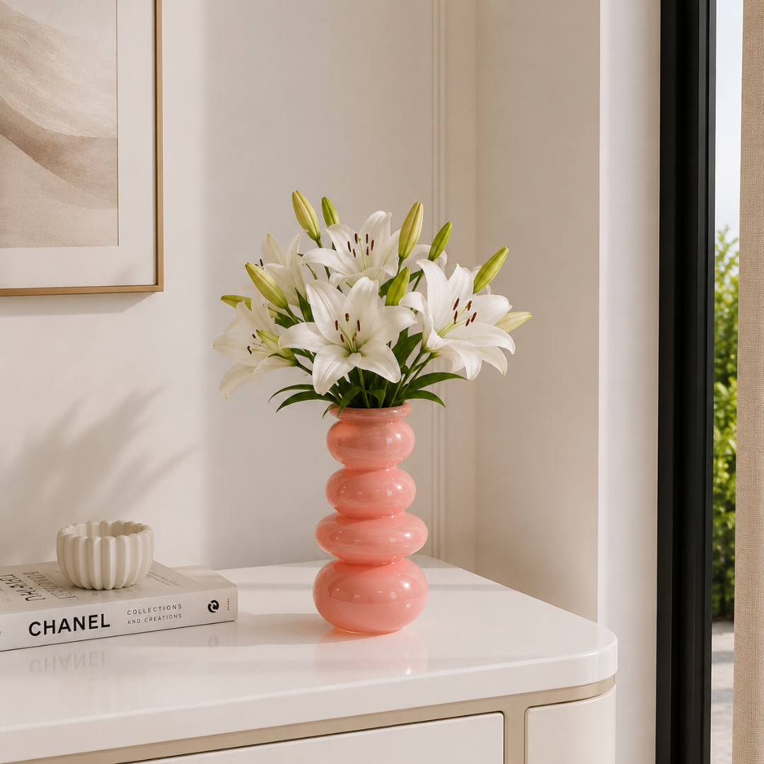 Vase en verre rose