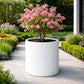 Grande jardinière béton ronde