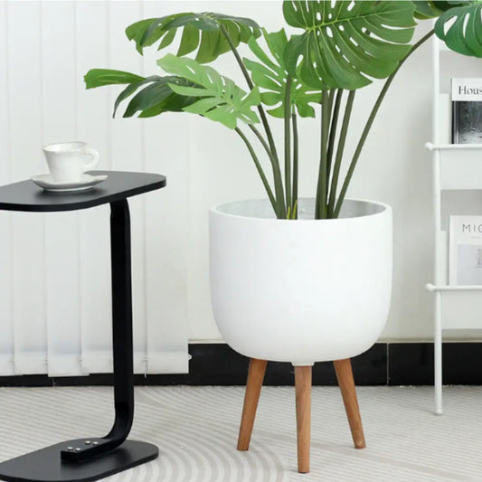 Pot de fleur avec pied en bois