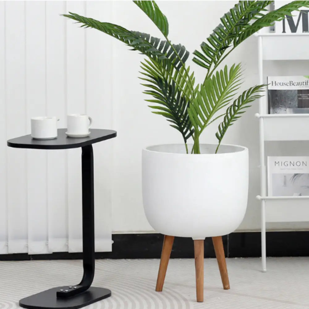 Pot de fleur avec pied en bois