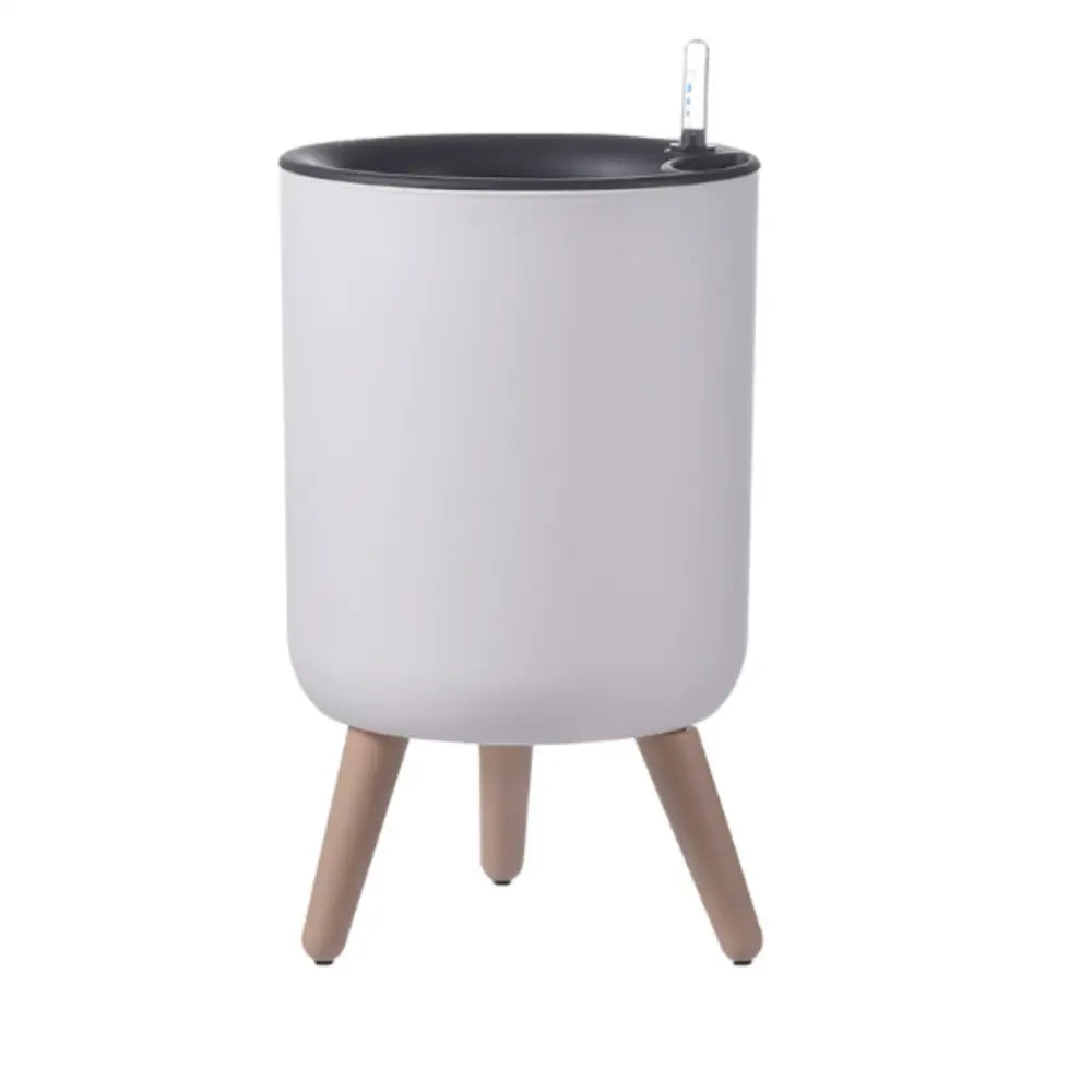 Pot de fleur sur pied blanc