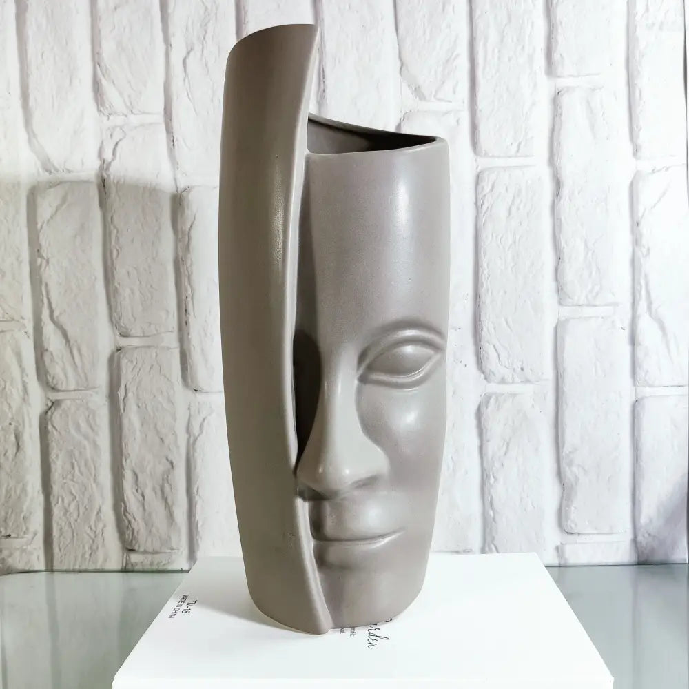 Vase avec visage