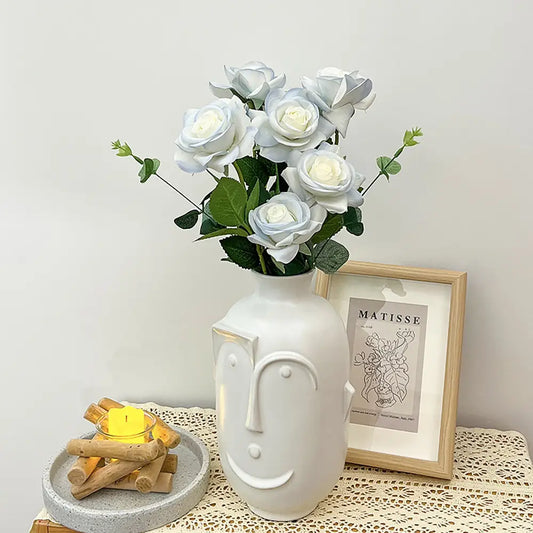 Vase blanc visage