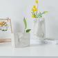 Vase visage humain