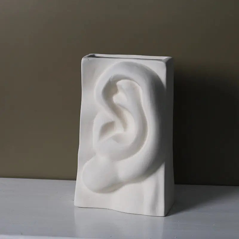 Vase visage humain - Oreille